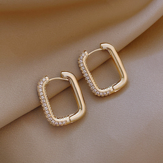 Gold women rectangular earring with stones
