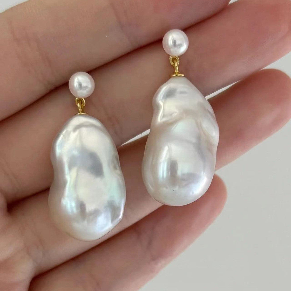 Natural pearl earrings antique price
