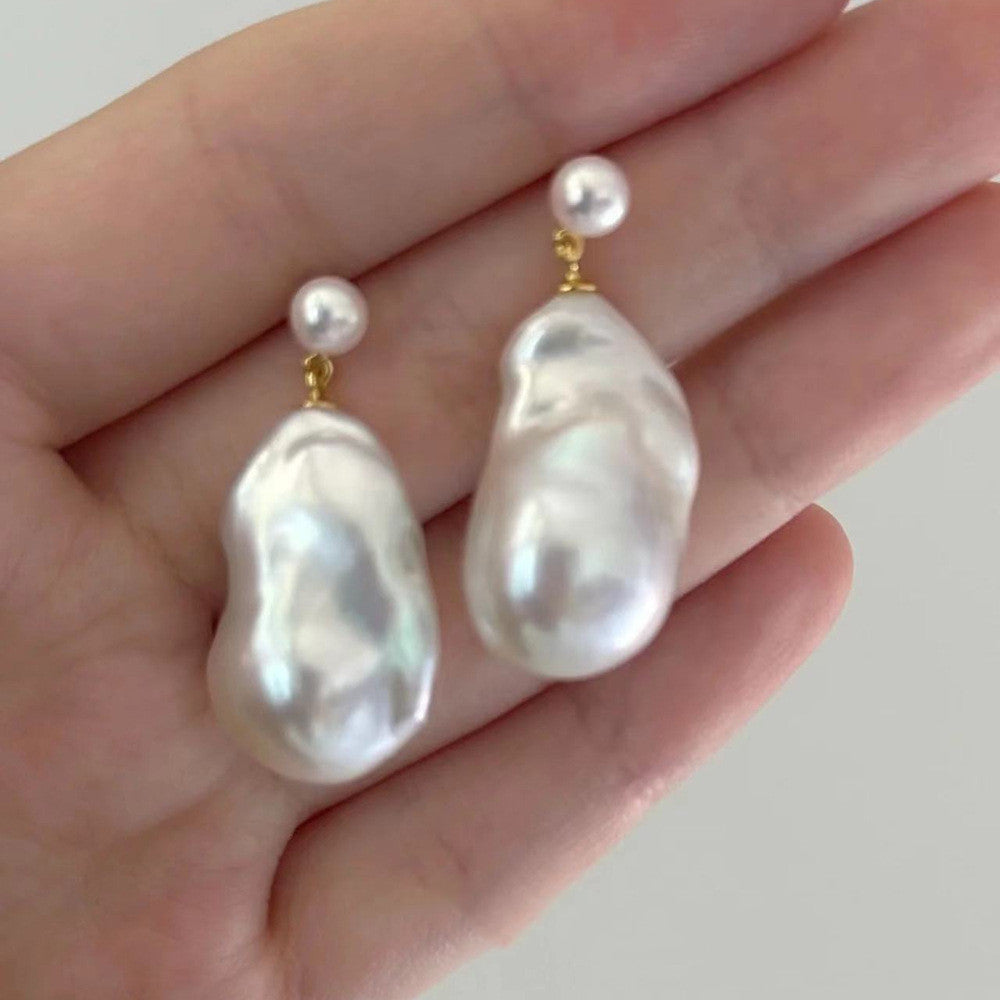 Natural pearl earrings antique worth