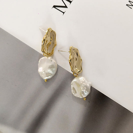 Women antique gold and pearl earrings
