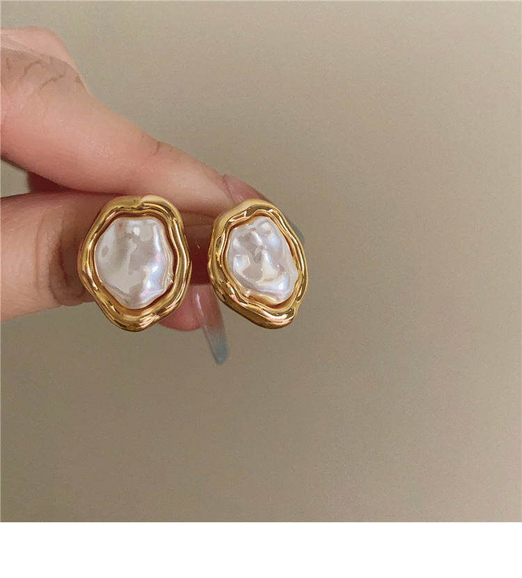 Women antique gold pearl earrings
